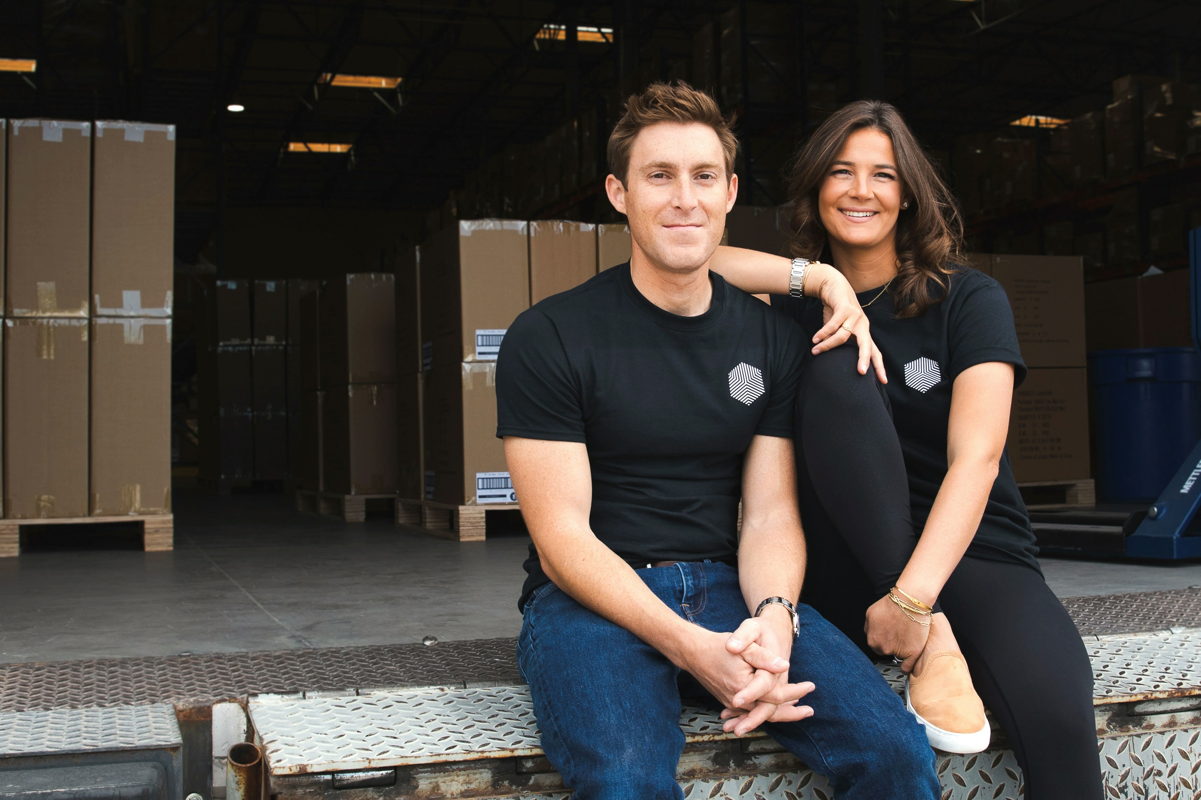 The founders of Mvnifest, Samantha Rose and Brian Rose, are pictured at the Mvnifest Fulfillment Center in Las Vegas, Nevada.